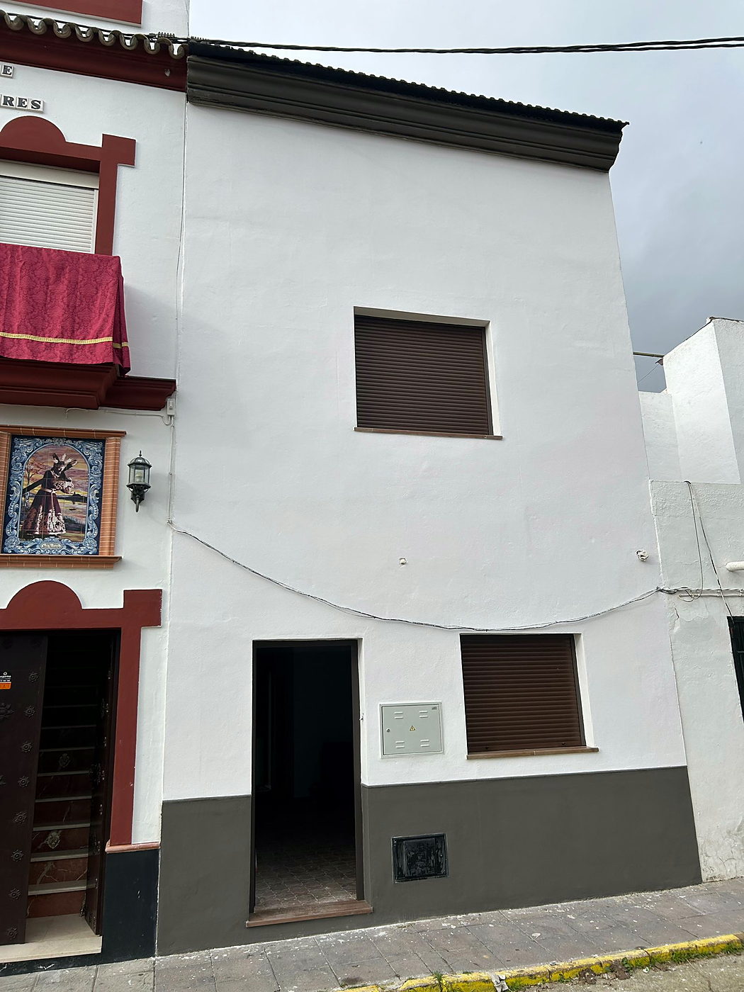 Fachada terminada tras la reforma integral de la vivienda